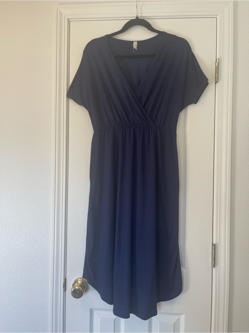 Classic Navy Wrap-Front Women’s Dress with Pockets.